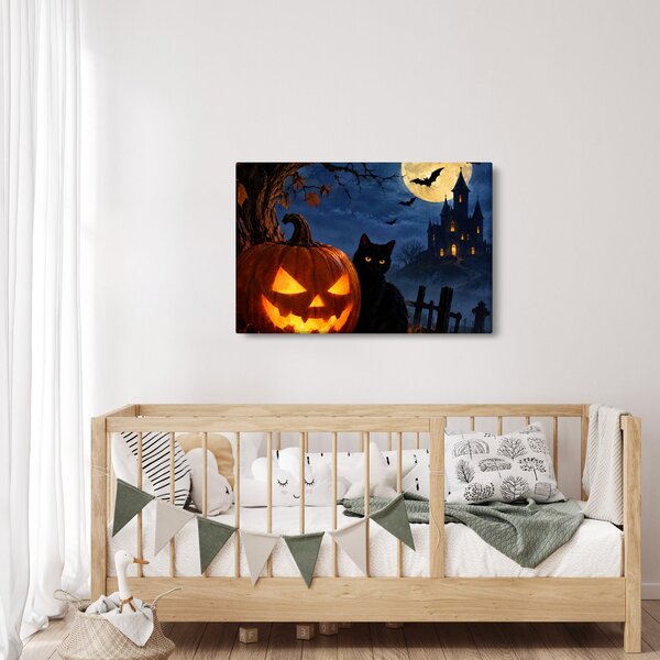 Kép - Fekete macska egy világító halloweeni tök mellett (90x60 cm)