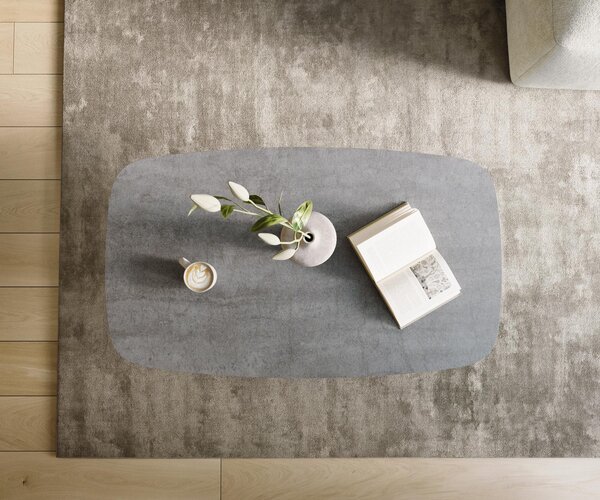 DELIFE Dohányzóasztal Edge hajóformájú 120x70 cm kerámia beton szürke Lumia akril