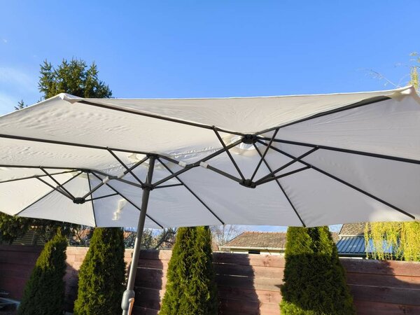 Kitekerhető 270x460cm ovális napernyő teraszra bézs / homok színű