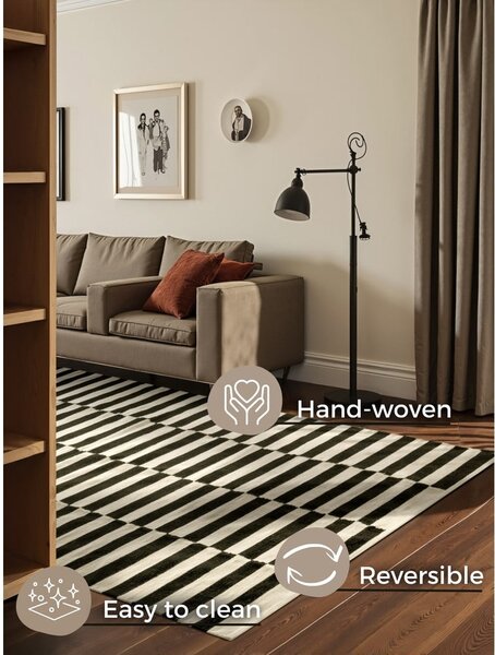 Fekete-fehér kétoldalas kézi szövésű gyapjú szőnyeg 200x300 cm Donna – Hanse Home