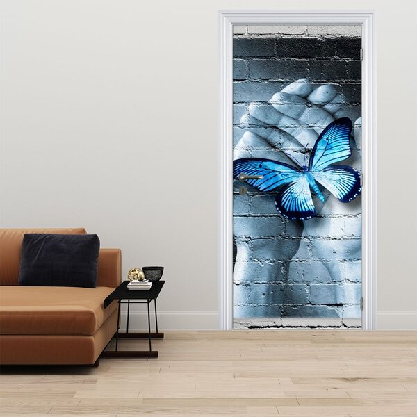 Fotótapéta ajtóra - Kék pillangó a falon (95x205cm)