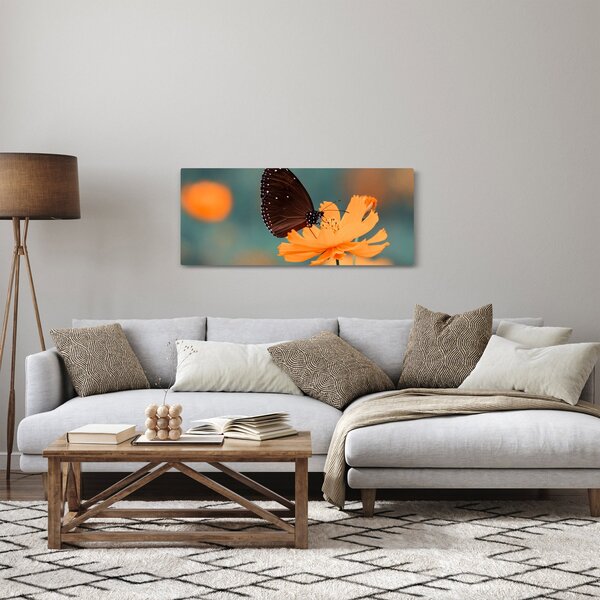 Kép - pillangó narancssárga virágon (120x50 cm)
