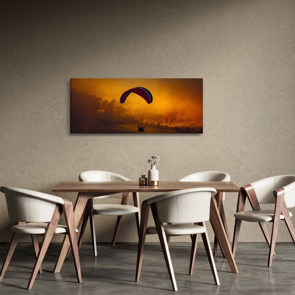 Ejtőernyős a naplementében képe (120x50 cm)