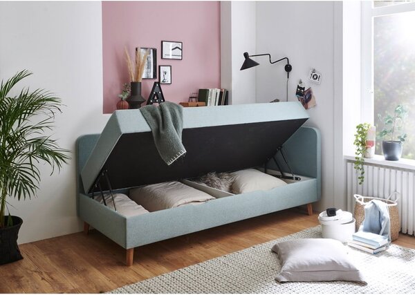 Világoskék kárpitozott egyszemélyes ágy tárolóhellyel 90x200 cm Cabana – Meise Möbel