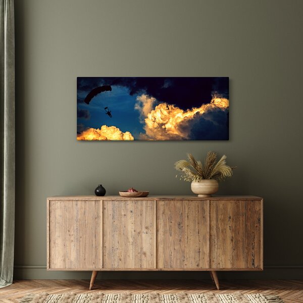 Ejtőernyős a felhőkben képe (120x50 cm)