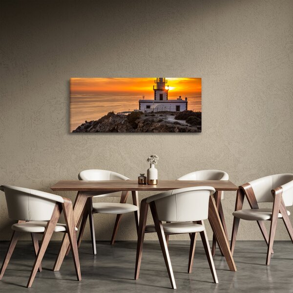 Világítótorony naplementekor képe (120x50 cm)