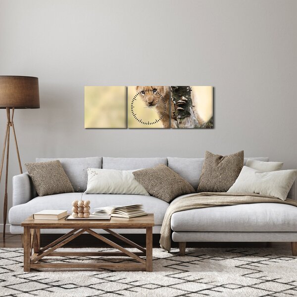 Egy oroszlán kölyök képe (órával) (90x30 cm)
