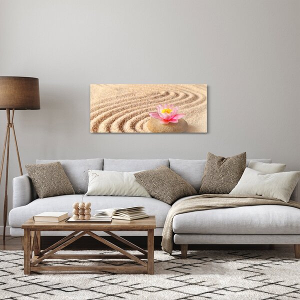 Egy kő, virággal a homokban képe (120x50 cm)