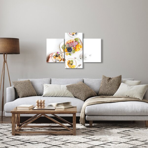 Tányérok gyümölcsökkel az asztalon képe (90x60 cm)