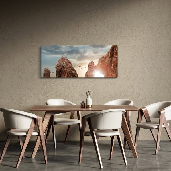 Kép - Naplemente a sziklák felett (120x50 cm)