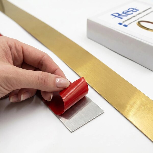 Öntapadós dekorációs szegélyléc Rea P14454CA 3,8cm Brush Gold