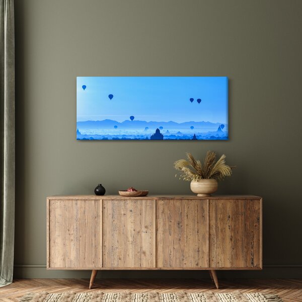 Kép - léggömbök a táj felett (120x50 cm)