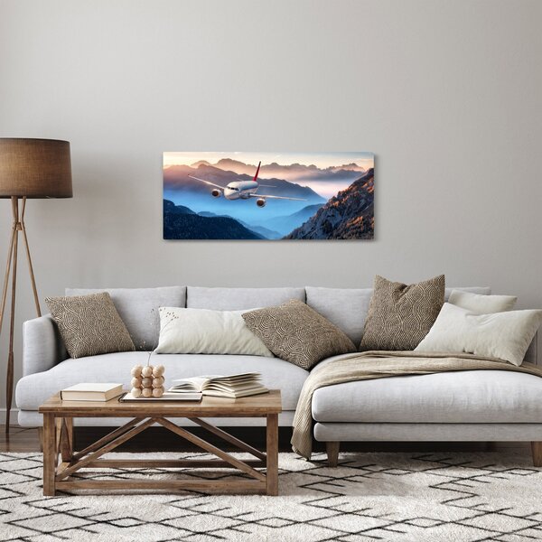 Kép - Repülőgép a hegycsúcsok felett (120x50 cm)