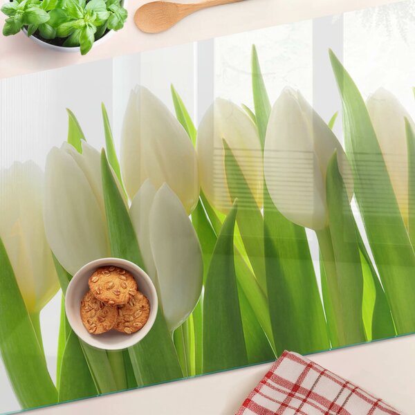 Üveg vágódeszka Tulipánok zöld levelek hátterében