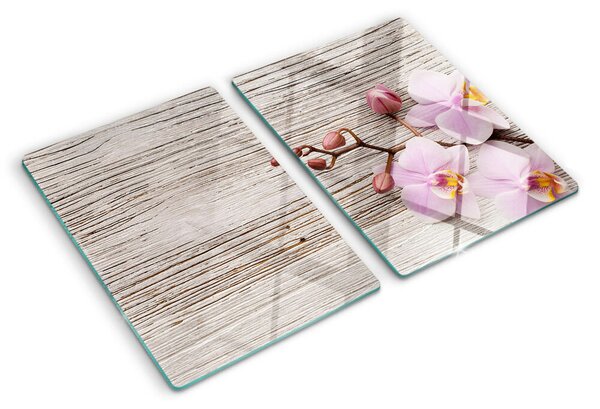 Üveg vágódeszka fényképpel Orchideák fa háttéren