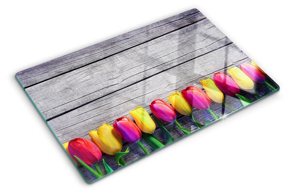 Üveg vágódeszka Tulipánok fa háttéren