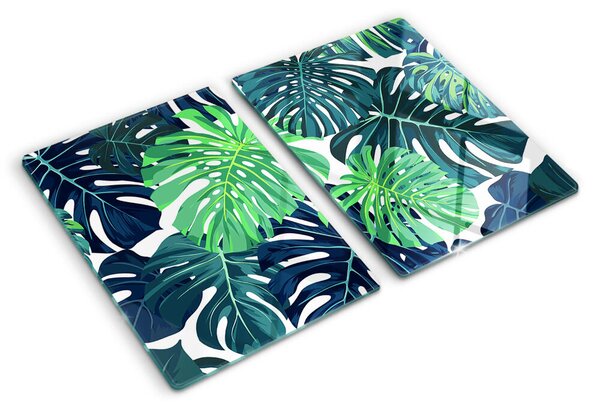 Üveg vágódeszka Monstera levelek trópusi háttéren
