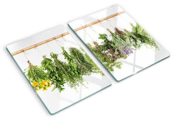 Üveg vágódeszka fényképpel Szárított gyógynövények egy madzagon