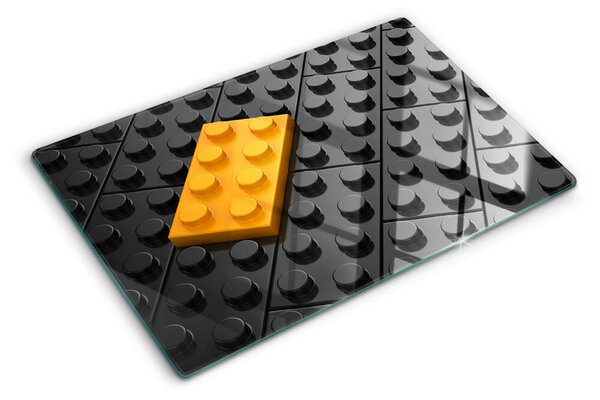 Edzett üveg vágódeszka LEGO kockák fekete háttéren