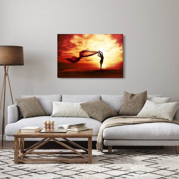 Kép - egy nő sziluettje a naplementében (90x60 cm)