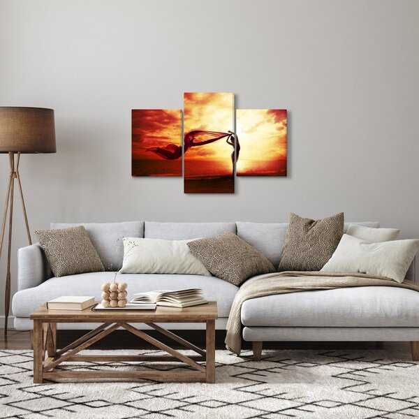 Kép - egy nő sziluettje a naplementében (90x60 cm)