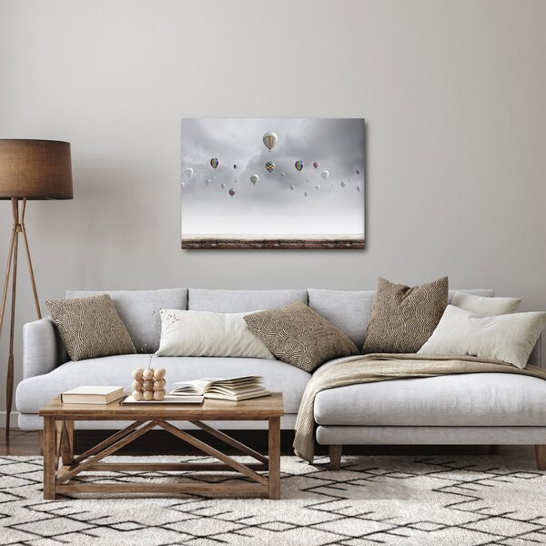Kép - léggömbök egy téglafal felett (70x50 cm)