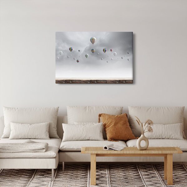 Kép - léggömbök egy téglafal felett (90x60 cm)