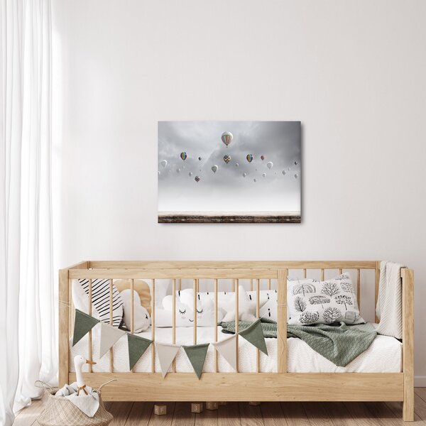 Kép - léggömbök egy téglafal felett (70x50 cm)