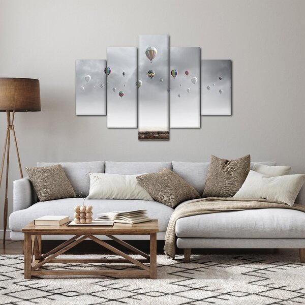 Kép - léggömbök egy téglafal felett (150x105 cm)