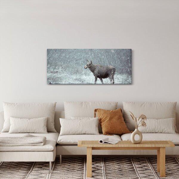 Kép - jávorszarvas egy hóval borított erdőben (120x50 cm)