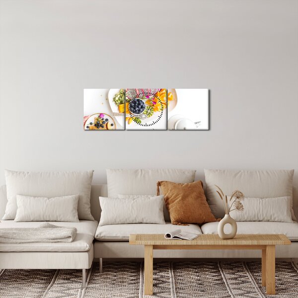 Tányérok gyümölcsökkel az asztalon képe (órával) (90x30 cm)