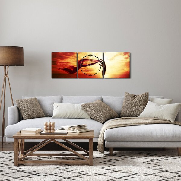 Kép - egy nő sziluettje a naplementében (órával) (90x30 cm)