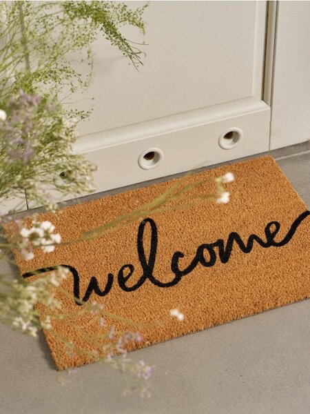 Sinsay - Lábtörlő "Welcome" felirattal - krémszínű
