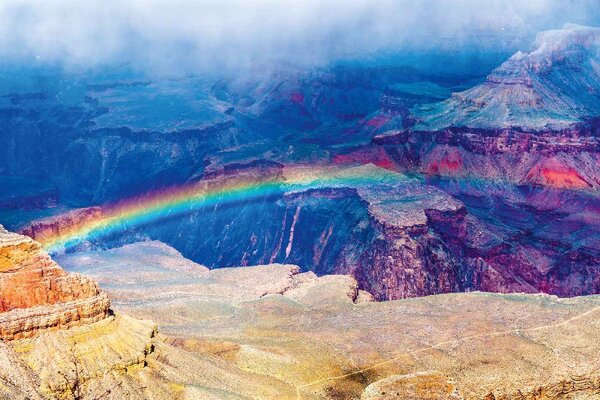 Nem szőtt fotótapéta szivárvány a grand canyon felett 375 x 250 cm