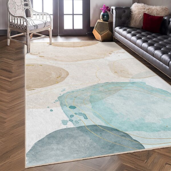 Krémszínű-türkiz mosható szőnyeg 80x150 cm Puddle – Mila Home
