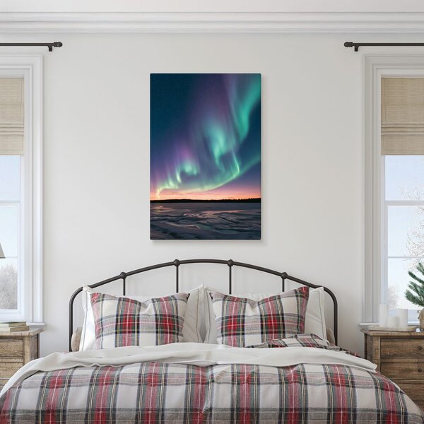 Kép téli táj az aurora alatt