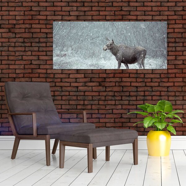 Kép - jávorszarvas egy hóval borított erdőben (120x50 cm)
