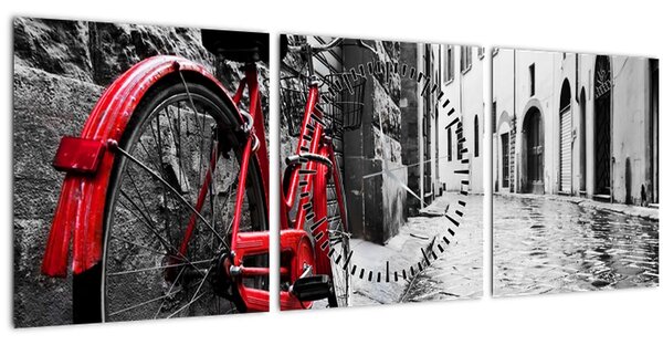 Egy vörös kerék képe egy macskaköves utcán (órával) (90x30 cm)