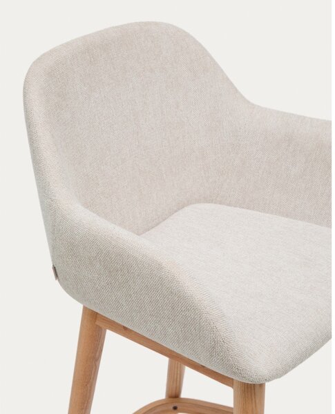 Bézs kárpitozott karfás bárszék (ülésmagasság 66 cm) Konna – Kave Home