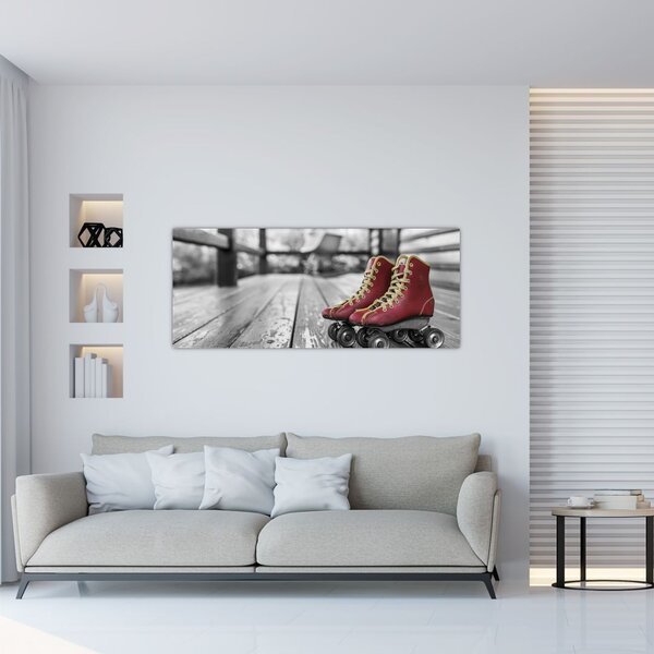 Egy piros régi görgős cipő képe (120x50 cm)