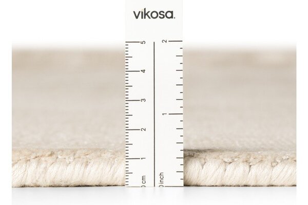 Elefántcsont színű kézi szövésű viszkóz szőnyeg 120x180 cm Noemi – Vikosa